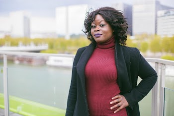 Photo of Woman in Turtleneck Top