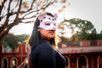 Photo of Woman in White Mask