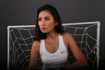 Photo of Woman in White Nike Tank Top