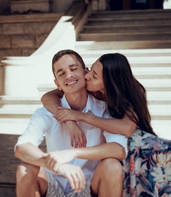 Photo of Woman Kissing Man