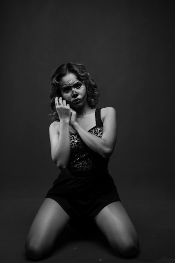 Photo of Woman Kneeling Down