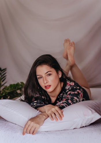 Photo Of Woman Laying On Bed