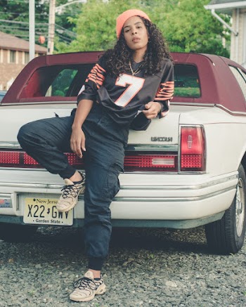 Photo Of Woman Leaning On A Car