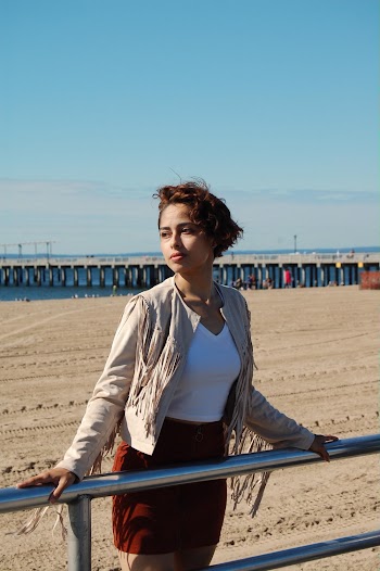 Photo Of Woman Leaning On Hand Rail