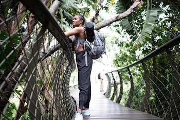 Photo Of Woman Leaning On Handrail
