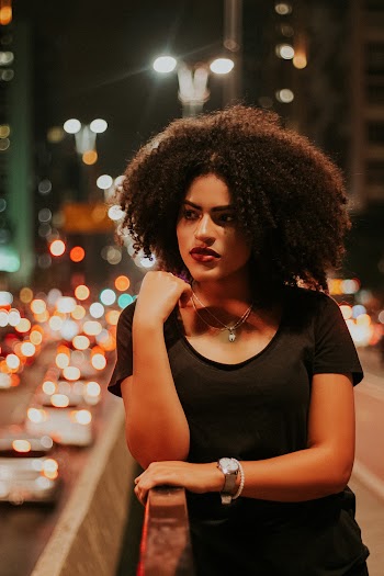 Photo Of Woman Leaning On Handrail