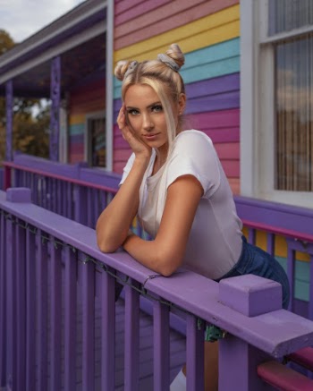 Photo Of Woman Leaning On Handrail