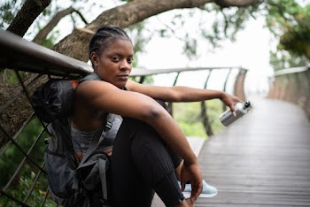Photo Of Woman Leaning On Handrail
