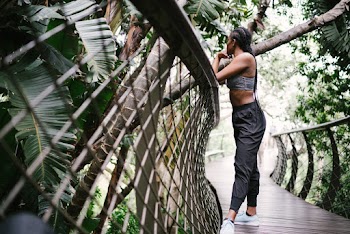 Photo Of Woman Leaning On Handrail