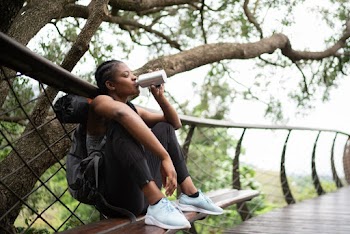 Photo Of Woman Leaning On Handrail