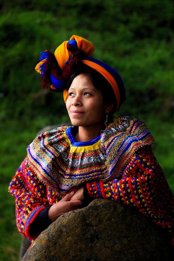 Photo Of Woman Leaning On Rock
