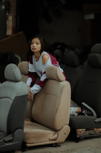 Photo Of Woman Leaning On Seat