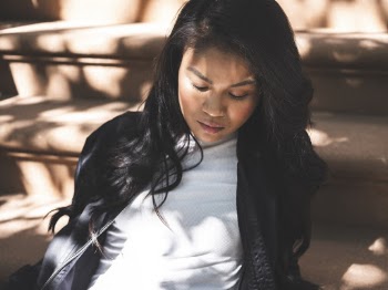 Photo Of Woman Leaning On Staircase