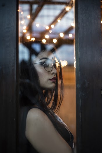 Photo Of Woman Leaning On The Door