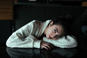 Photo Of Woman Leaning On The Table