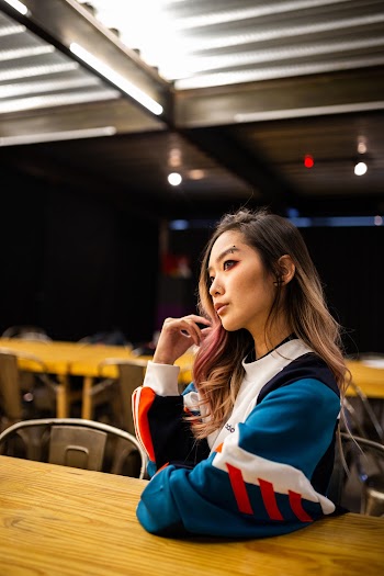Photo Of Woman Leaning On The Table