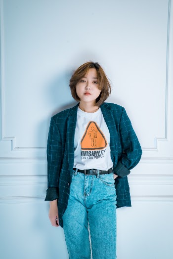 Photo Of Woman Leaning On The Wall