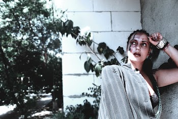 Photo Of Woman Leaning On The Wall