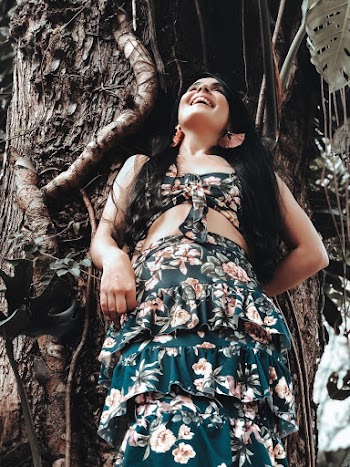 Photo Of Woman Leaning On Tree