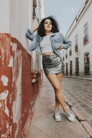 Photo Of Woman Leaning On Wall