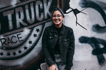 Photo Of Woman Leaning On Wall
