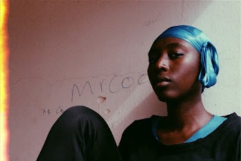 Photo Of Woman Leaning On Wall