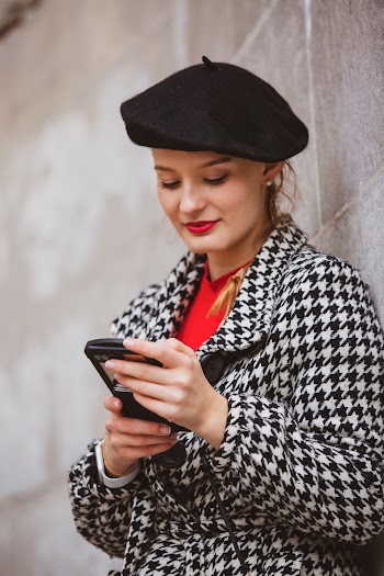 Photo Of Woman Leaning On Wall