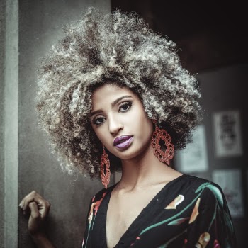 Photo Of Woman Leaning On Wall