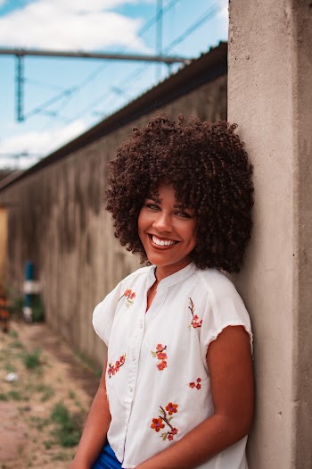 Photo Of Woman Leaning On Wall