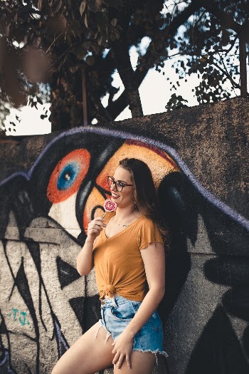Photo of Woman Leaning On Wall