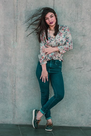 Photo Of Woman Leaning On Wall