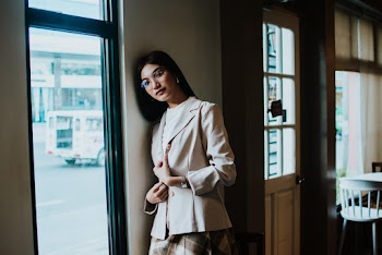 Photo Of Woman Leaning On Wall