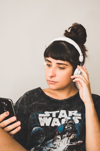 Photo of Woman Listening To Music