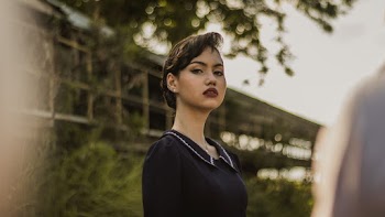 Photo of Woman Looking and Standing