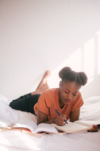 Photo Of Woman Lying On Bed