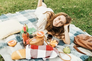 Photo Of Woman Lying On Blanket