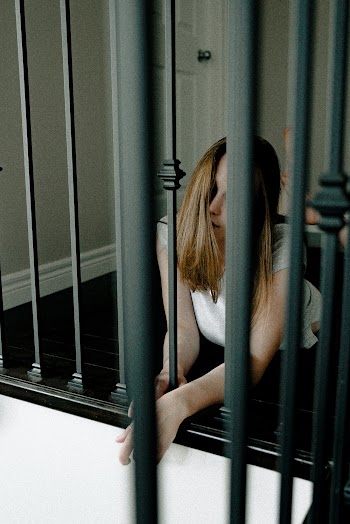 Photo Of Woman Lying On Floor 