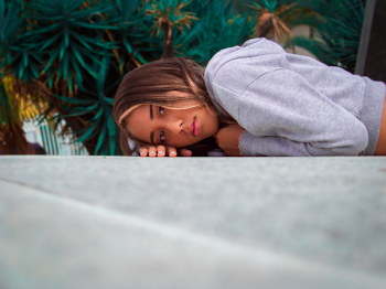 Photo of Woman Lying on Ground