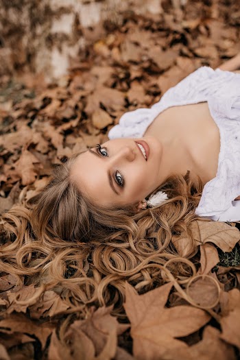 Photo of Woman Lying on Ground
