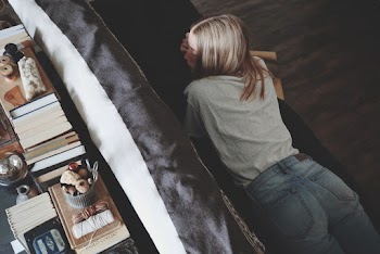 Photo Of Woman Lying On The Couch