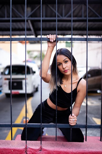 Photo of Woman Near Fence