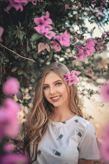 Photo Of Woman Near Flowers