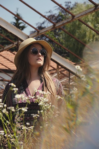 Photo Of Woman Near Flowers