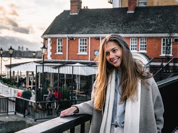Photo of Woman Near Handrail