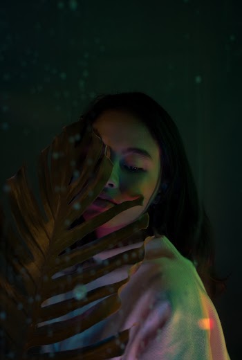 Photo Of Woman Near Leaf