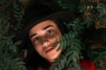 Photo Of Woman Near Leaves