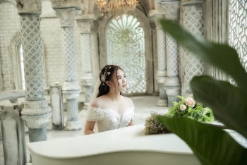 Photo Of Woman Near Piano