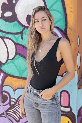 Photo Of Woman Near Wall