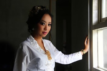 Photo of Woman Near Wiindow