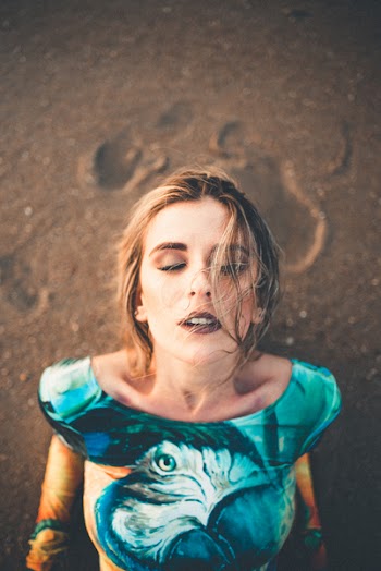 Photo of Woman on Beach Sand